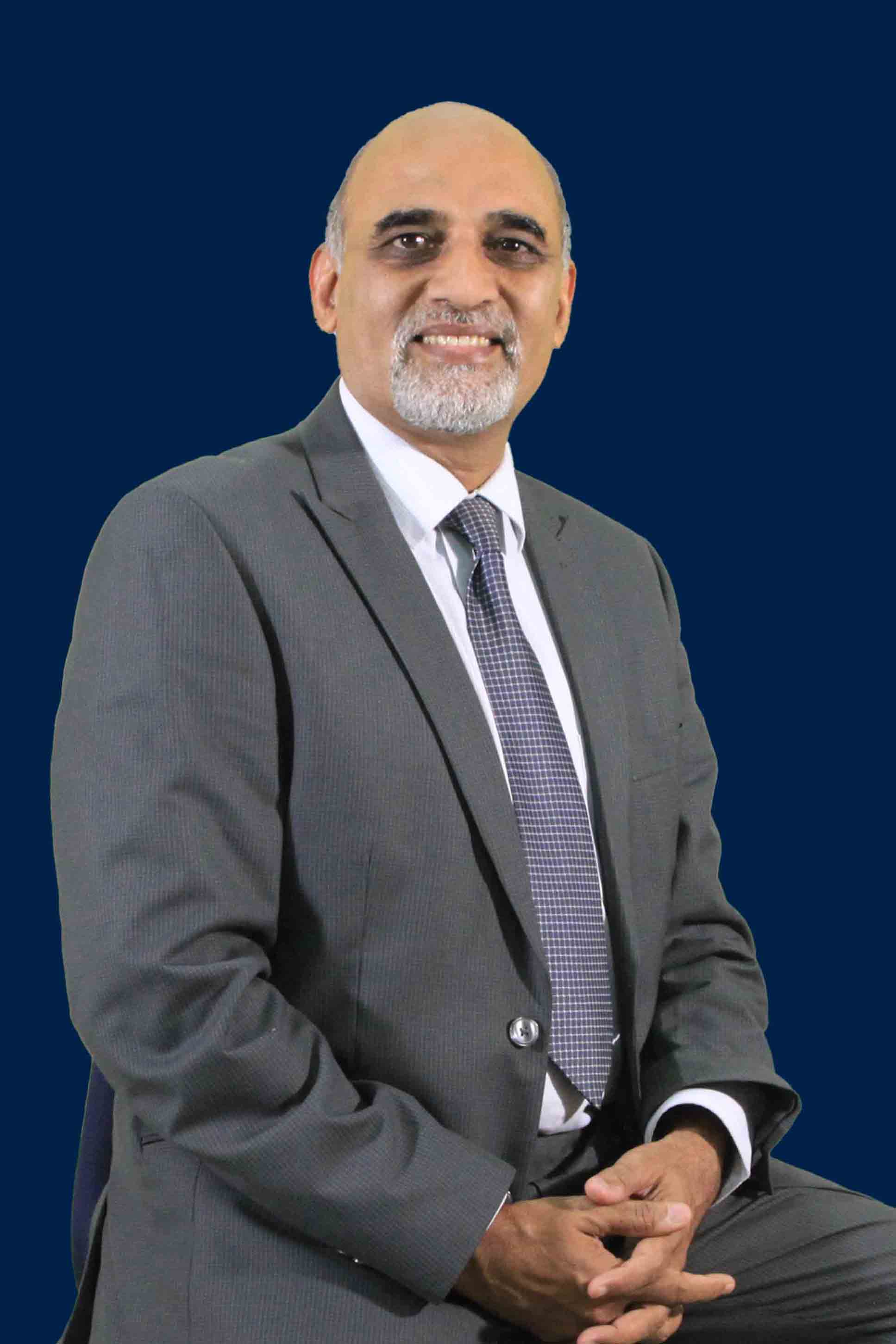 Dr. Kamal Kishore Sharma Director General Taxila Business School